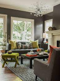 To seat 10 people you'd have to have the conversation area on all 4 walls of the living room. Modern Living Room With Medium Grey Walls And Chartreuse And Pumpkin Accents Fun Living Room Furniture Placement Living Room Living Room Transitional
