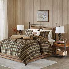 The printed pattern features a textured style to provide depth to the pattern. Hadley Plaid Comforter Set By Woolrich Designer Living