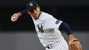 George Lombard Jr. fielding a ground ball during a New York Yankees game