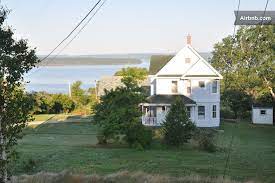 Farm House On The Ocean Sydney Ns In South Bar Beach Houses For Rent House Historic Homes