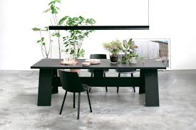 Consider a sleek black or espresso finish for a modern, minimalist setup, or go for a weathered veneer for a more rustic vibe. Dining Table Fayland By David Chipperfield In Jet Black Oak Side Chair Houdini By Stefan Stefandiez Pendant Light Dining Room Design Modern Furniture Table