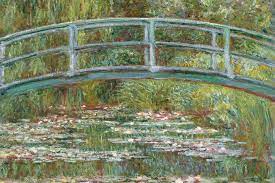 Bridge over a pond of water lilies