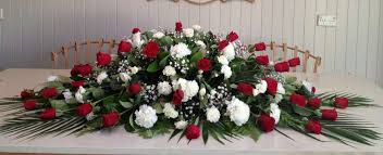 Honor your loved ones with casket. Red And White Casket Flowers