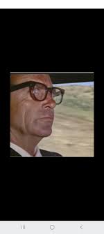 Who is the driver of the black charger in Bullitt?