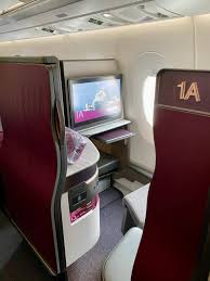 The wall doesn't quite reach the ceiling so it isn't fully enclosed. Qatar Airways Qsuite Business Class Airbus A350 1000 Review Photos