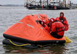 Crewmembers from Coast Guard Cutter Hawser and Coast — NARA ...