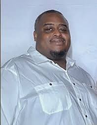 This is a picture of my Great grandmother who passed away in 2024 it would  really mean alot if someone could enhance this photo I'm trying to get it  blown up into