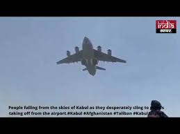 New video from #kabul monday morning of people rushing towards kabul airport with gunfire in desperate afghans are hanging on the plane tires and falling from the sky near the kabul airport. Ubvx0ujcxomcdm