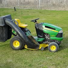 When you own a john deere model la130 lawn tractor, you have the option of allowing the cut grass to emerge from the chute or having it discharged into the two rear baggers that push the ends of the bagger support rod into the corresponding holes on the rear cargo mounts. Find More John Deere Lawn Tractor With Mower Bagger Snowblower Weights And Chains For Sale At Up To 90 Off