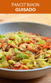 Pancit Bihon Guisado With Rice Noodles Meat Shrimp And Vegetables Is Sure To Be A Family Favorite Perfect For Everyday M Pancit Pancit Bihon Recipe Recipes