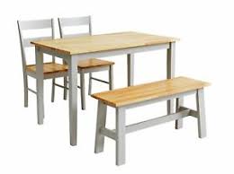 This set includes 4 woven high dining swivel chairs and a 55,000 btu fire pit that doubles as a high dining table. Argos Solid Wood Dining Room Table Chair Sets For Sale Ebay