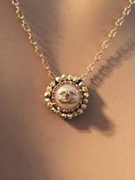 A Petite Classic This Chanel Button Necklace Looks Pretty On Everyone 1 Available French Inspired Jewelry Jewelry Necklace