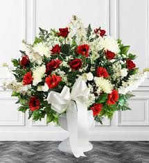 You can purchase online or come to our store to buy fresh cut flowers, plants, blooming plants, decorative trees, silk flowers, floral decor, vase flower arrangements, bulk flowers, flowers for weddings, funeral and sympathy flowers. Red White Sympathy Floor Basket Avas Flowers