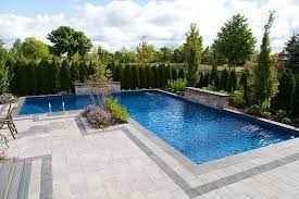 You can choose to add a raised circular spa with a spillway or a square spa flush with the vanishing edges. The Dassanayakes Inground Pool Pioneer Family Pools Backyard Pool Landscaping Swimming Pools Backyard Inground Pool Landscaping