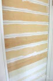 We have shiplap all over our house and its clean lines make it one of my favorite design elements to use! Diy Faux Shiplap Get The Look Without The Expense Artsy Chicks Rule
