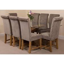 This is a unique set of two quality dining chairs with a tan fabric material. Valencia Oak Large Glass Dining Table 8 Washington Grey Fabric Chairs