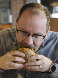 Canton man cashes in year of free Bagger Dave's burgers