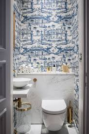 Whether it's ok to do, what type of wallpaper to use, if you need to seal it, & more! 25 Chic Ways To Use Wallpaper In A Guest Bathroom Amazing Bathrooms Blue And White Wallpaper Beautiful Bathrooms