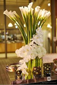 Shorter than most asiatic lilies, rozalynn works perfectly as a border or in containers. Tall Centerpiece Calla Lily Wrapped In White Orchids And Hydrangea Event Planning Orchid Centerpieces Wedding Tall Wedding Centerpieces Orchid Centerpieces