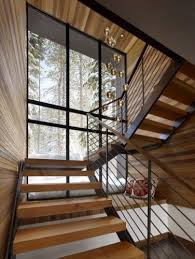 Snow View From Under The Stairs Window Seat Bocci Pendant Chandelier John Maniscalco Architecture Modern Stairs Modern Staircase Staircase Design