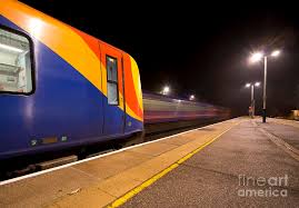 Passing Trains In The Night Photograph By Rob Hawkins