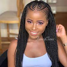 Pin the crown hair up in a small ponytail and let the rest of your hair fall on your back and shoulders. African Braids Straight Up Hairstyles 2020 Novocom Top