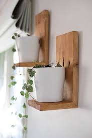 We like the hanging shelves in the window so much that we decided to sleuth out the perfect wooden trellis to recreate the look at home. The Nicest And Cleverest Diy Floating Shelving Idea And Its Multi Advantages Diy Aspects Timber Floating Shelves Plant Shelves Floating Shelf Decor