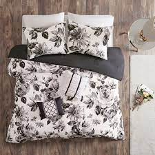 And as i have 2 twin beds in the room, the two comforters are not even off center the same so they look kind of weird and very asshmetrical. Twin Twin Xl 4pc Hannah Floral Print Comforter Set Black White Target