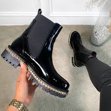 Maybe you would like to learn more about one of these? Clover Black Patent Studded Ankle Boots
