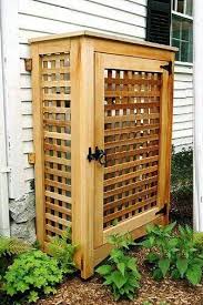 Pin By Cork Bored On Patio And Shed Backyard Hide Trash Cans Yard