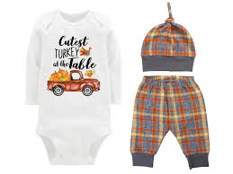 My first thanksgiving outfit for baby boys with turkey on bottom. Boy First Thanksgiving Outfit Fall Baby Outfit Fall Plaid Pants Knot Hat Turkey Pumpkins Old Truck Orange Gray Pants Boyish Thanksgiving