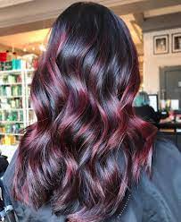 Cranberry Hair Color Is Trending Just In Time For The Holidays The Maroon Hue Resembles The Dark Re Hair Color Burgundy Merlot Hair Color Cranberry Hair Color