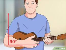 How we hold a guitar is how we use our bodies. 3 Ways To Hold A Ukulele Wikihow