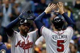 Milwaukee Wi April 29 Matt Kemp 27 And Freddie Freeman 5 Of The Atlanta Braves Celebrate After Kemp Hit A Home Run In Th Matt Kemp Atlanta Braves Freeman