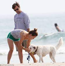 He S Still Top Dog Olivia Wilde Fusses Over Her Beloved Hound Paco As Boyfriend Jason Sudekis Looks On Daily Mail Online