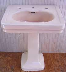 There is no counter space with a pedestal sink, and the base of the sink is usually made of the same material as the sink itself for design continuity. Antique 1928 Tan Kohler Pedestal Sink Dea Bathroom Machineries