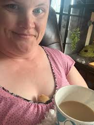 Any other women guilty of cuddling a chick 🐣 lol this one loves to ride  around in my bra 🤣🥰🐥