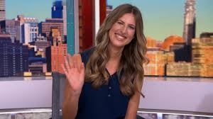 Christina Derevjanik celebrates her win on Wheel of Fortune