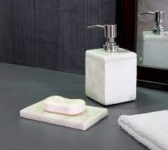 Each handmade stoneware accessory is finished with a white rubber coating, making it easy to clean while adding to the minimalist look. Amazon Com Kleo Bathroom Accessory Set Made From Natural Stone Bath Accessories Set Includes Soap Dispenser Toothbrush Holder Soap Dish White Set Of 2 Home Kitchen