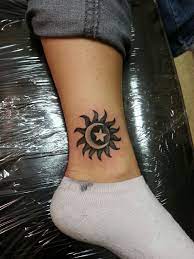 Moon And Sun Tattoo I Would Add Stars And Do On My Calf Star Tattoos Moon Tattoo Designs Sun Tattoos