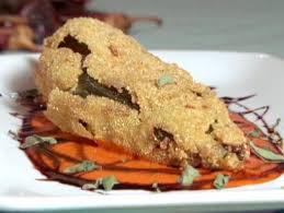 In 1858 it was described as a green chile pepper stuffed with minced meat and coated with eggs. Chile Relleno Recipe Food Network