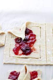It is used for making pastries in middle eastern and balkan cuisine.filo dough is made with flour, water, and a small amount of oil or white vinegar, though some dessert recipes also call for egg yolks.filo can be used in many ways: Raspberry Jam Filled Puff Pastries Easy Homemade Christmas Pastries