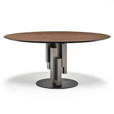 Round patio coffee tables pair especially well with sectional sofas or furniture styled in a circle around the table that mirrors its shape. Skyline Round Wood Dining Table By Glassdomain Co Uk