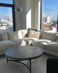 Arc floor lamp over sectional. Floor Lamp Bellina Arc Living Spaces