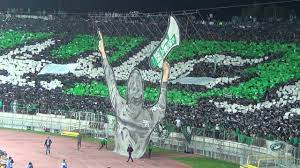ودخل الرجاء البيضاوي بخالد العسكري في المرمى، وفي خط الدفاع زكريا الهاشمي وإسماعيل بنلمعلم وعديل الكروشي ومحمد ولحاج، وفي خط الوسط محسن متولي قائد الفريق توقع جمهور الرجاء البيضاوي، والذي بلغ عدده 37 ألفا، ردا من لاعبه لكن البايرن ظل مركزا قويا منظما. Tifo Curva Sud Casablanca Ø±ÙˆØ¹Ø© ØªÙŠÙÙˆ Ø¬Ù…Ù‡ÙˆØ± Ø§Ù„Ø±Ø¬Ø§Ø¡ Ø§Ù„Ù…ØºØ±Ø¨ÙŠ ÙÙŠ Ù…Ø¨Ø§Ø±Ø§Ø© ØªÙŠ Ø¨ÙŠ Ù…Ø§Ø²ÙŠÙ…Ø¨ÙŠ Ø§Ù„ÙƒÙˆÙ†ØºÙˆÙ„ÙŠ Youtube