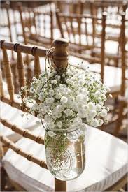 8 Awesome And Easy Ways To Decorate Wedding Chairs Elegantweddinginvites Com Blog Vintage Wedding Flower Arrangements Vintage Wedding Flowers Mason Jar Wedding Decor