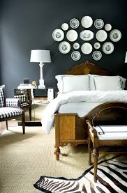 Courtney Giles A Bold Bedroom Design With Black Walls Antique Wood Bed And Bench Mirrored Modern Nightstands Alabaster L Bedroom Design Plates On Wall Home