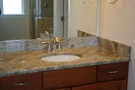 If the cabinet has no back, simply attach it to the wall so it encloses the plumbing. Bathroom Vanity Top Contractor The Countertop Factory