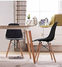 iskandinav ev dekorasyon fikirleri eames yemek masasi sandalyesi koltuklar