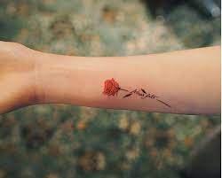 Each tattoo is unique, for example with rose tattoos; Image Result For Wrist Writing Tattoos Shape Of Heart With Rose Small Rose Tattoo Rose Tattoos For Women Writing Tattoos